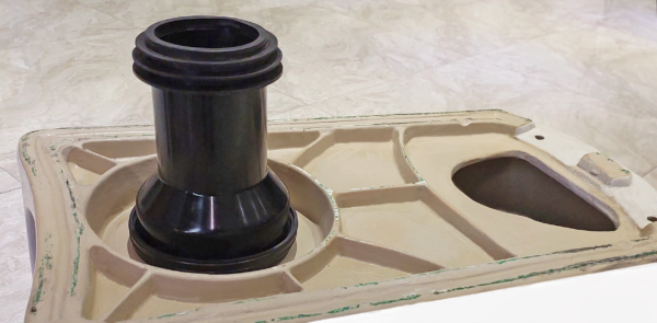 Spigot flange fitted to underside